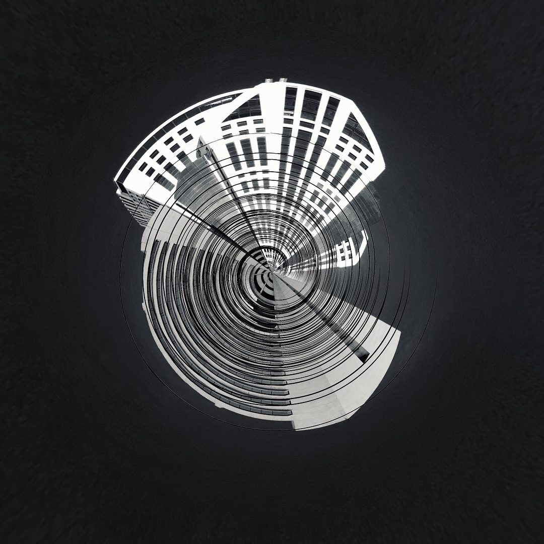 Abstract black and white circular architectural pattern